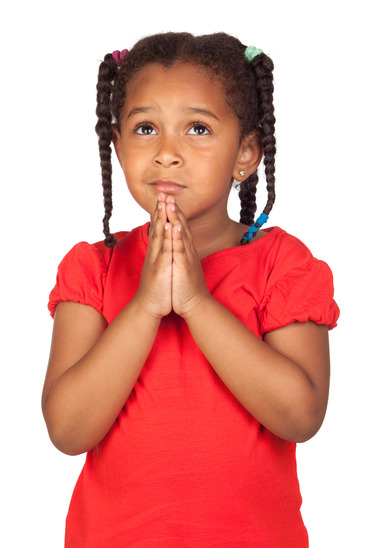Sad little girl praying for something